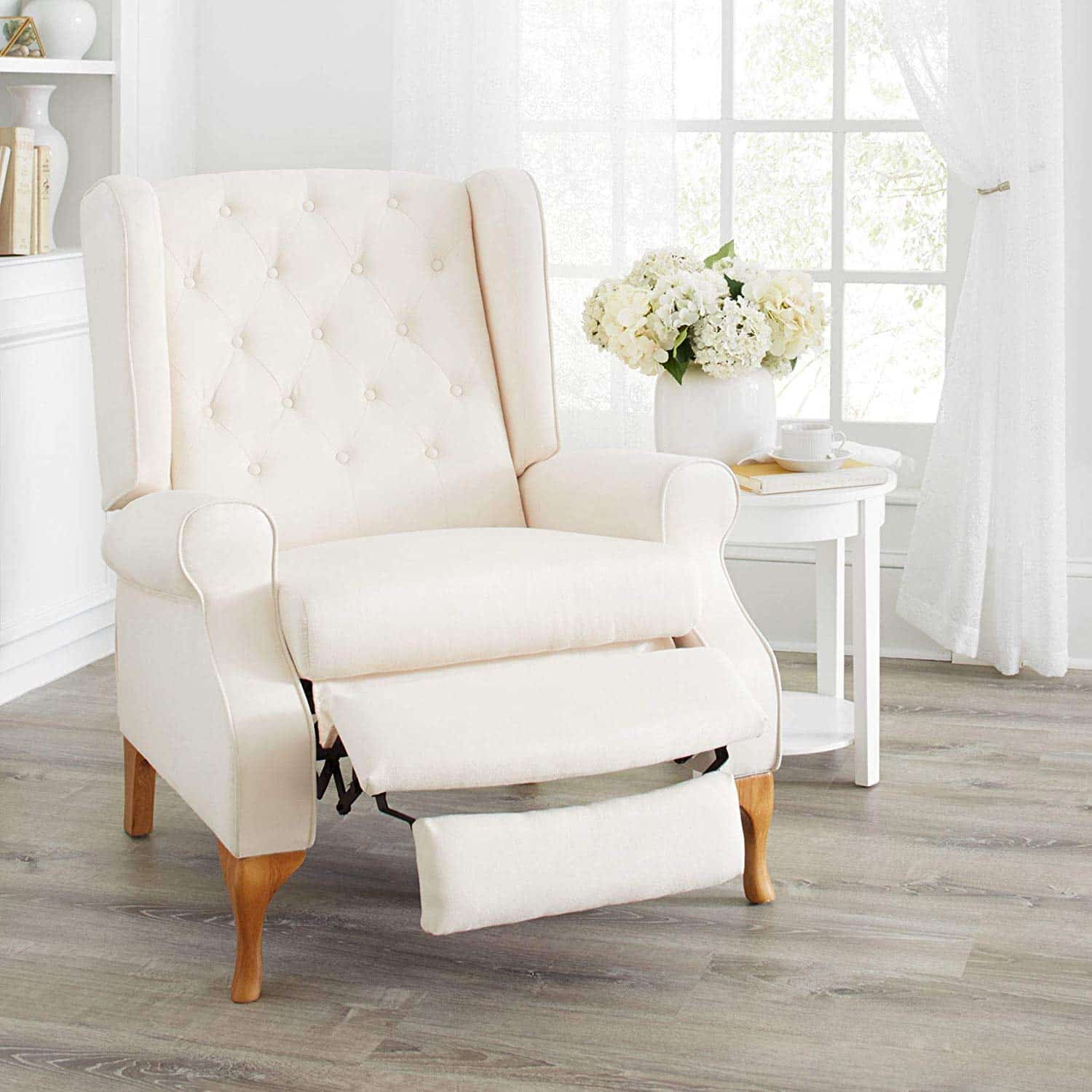 Small white leather recliner chair